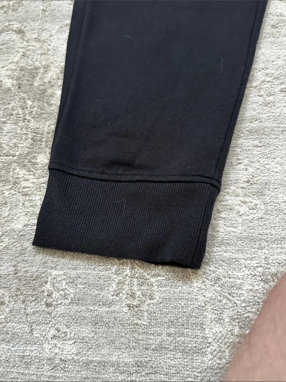 The North Face Men’s Large duo of one gray sweatpants and one black jogger.